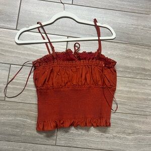 NWT Medium top. Cute with high waisted jeans.